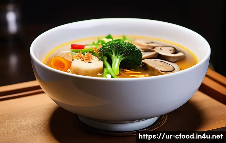 중국 요리의 현대화 - A modern Chinese fusion dining scene showcasing a beautifully plated hot and sour soup infused with ...